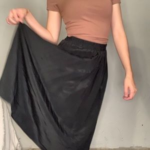 Black tea length skirt with pleats